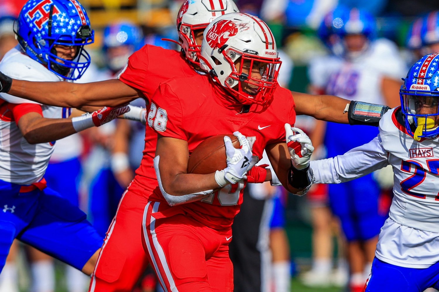 Katy High senior running back Jalen Davis (28) carries the ball during the Tigers’ Class 6A-Division II state semifinal game against Buda Hays on Jan. 9 at McLane Stadium in Waco. Davis verbally committed last week to continue his football career at Stephen F. Austin.